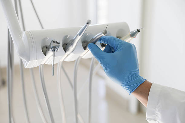 Professional Dental Implants technician working in Ithaca, MI